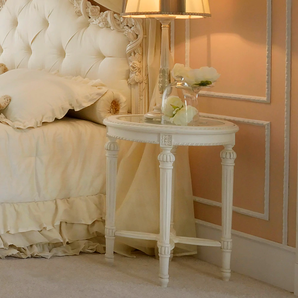 A charming handmade table will add elegance and style to the bedroom