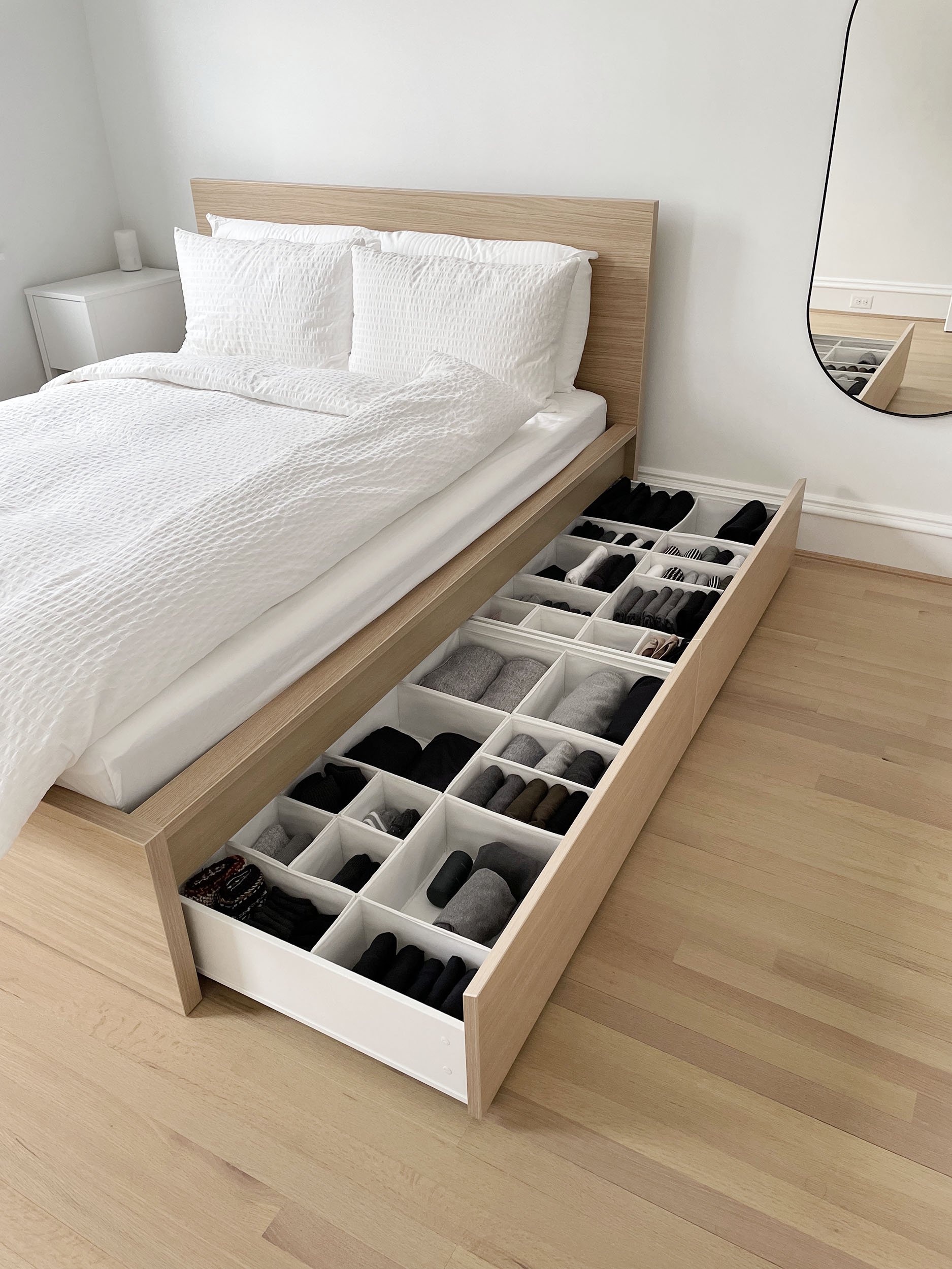 storage space with pull-out drawers under the bed