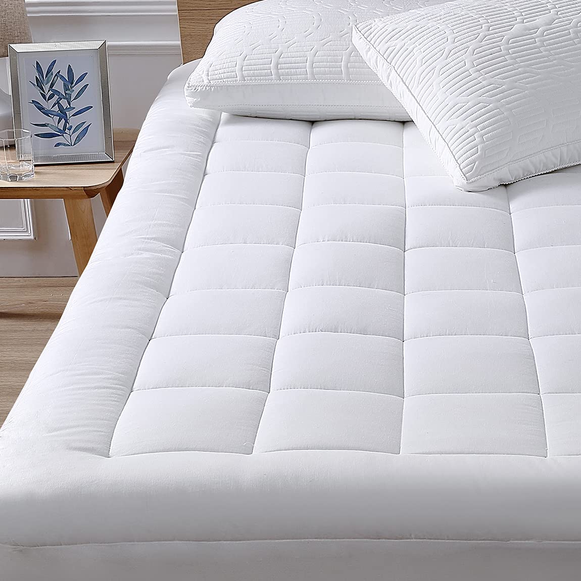 Cooling mattress pads and toppers